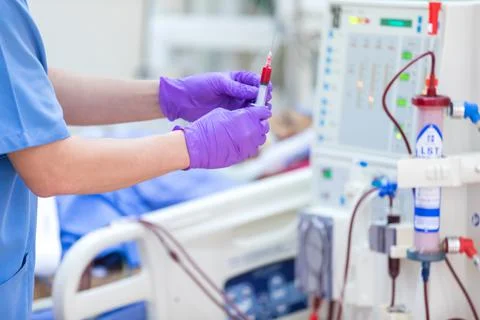 The specialist are doing continuous renal replacement therapy equipment and i Stock Photos
