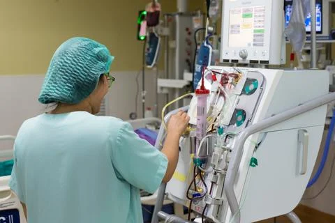 The specialist are doing continuous renal replacement therapy equipment and i Stock Photos