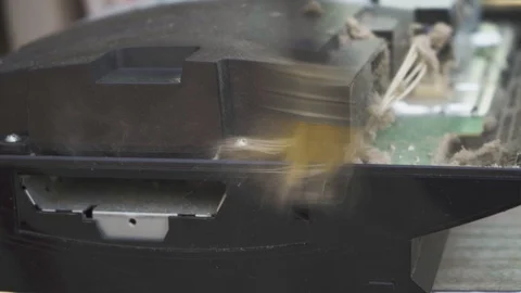 Specialist cleans the game console board from dust with a brush Stock Footage 108563771