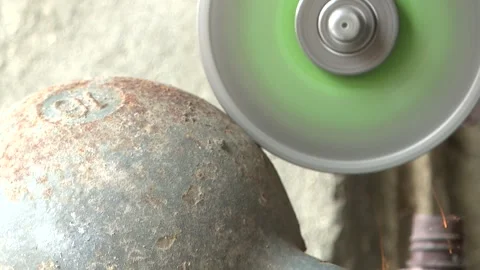 A specialist cuts metal with a machine 2 Video stock 311645292