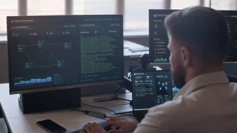 Specialist Managing Network System on Computer in Security Center Stock Footage 334934638