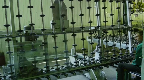 A Specialist Putting Some Small Items on a Moving Glazing Glass Pane, Sitting Stock Footage 53006084