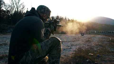 Specialist from the special forces unit fires at a military training Stock Footage 128126813