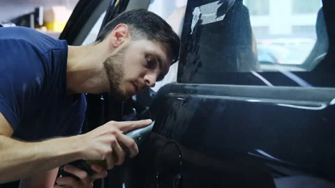 Specialist uses grinding machine to smooth out surface Stock-Footage 317635539