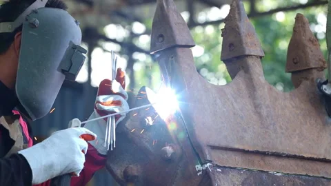 Specialist welder weld construction frame, welding spark , Welder is weldin.. Stock Footage 336936861
