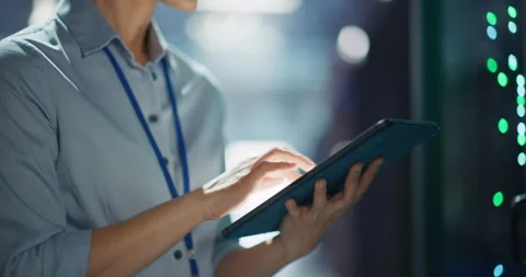 Specialist Working with Tablet Computer in Data Center Stock Footage 320000506