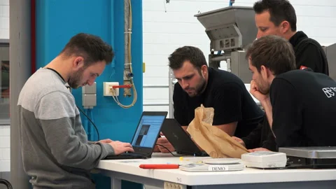 Specialists in amber sorting communicate in the shop Stock Footage 92910378