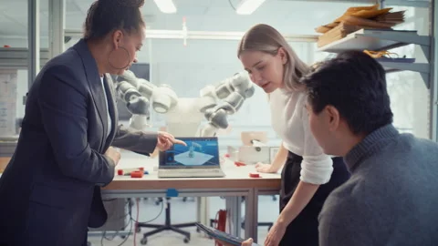 Specialists Discuss with Black Chief Engineer Stock Footage 187559656