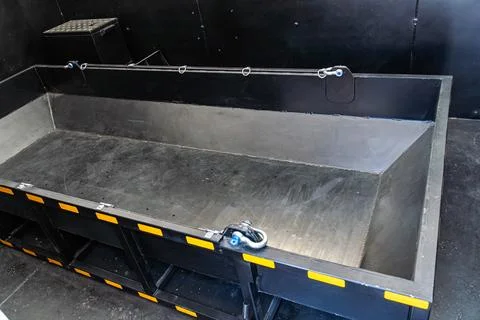 Specialized blast containment chamber installed in a bomb disposal vehicle. B Photos