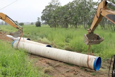Specialized equipment for placing large diameter pipe in a trench Stock Photos