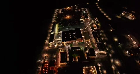 Specialized Refinery Plant On Mountain Side Brightly Lit During The Night Drone Stock Footage 289410266