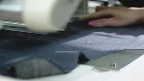 Specialized sewing machine in factory, automatic sewing flaps Stock Footage 313433807
