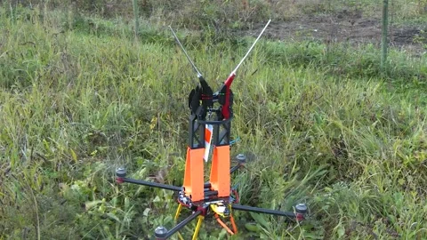 Specialized Utility Drone Taking Off Toward Power Lines Stockbeeldmateriaal 346307303