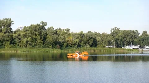 A specialized vessel for cleaning river Stock Footage 332190611