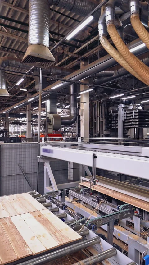 A specially equipped automatic machine is grinding wooden boards to a flat  Stock Footage 269997511