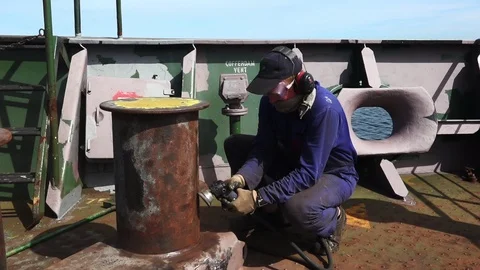 Specially equipped man tides vessel element on deck Stock Footage 113454949