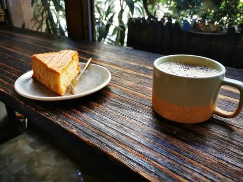Specialty brewed coffee, slice of apple cake Foto stock