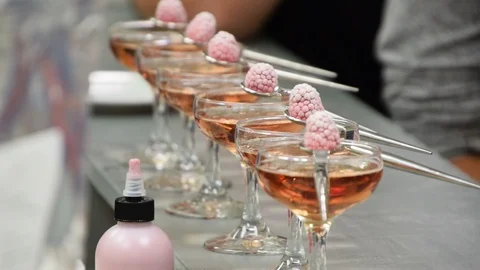 Specialty drinks are lined up on a bar Stock Footage 93514426