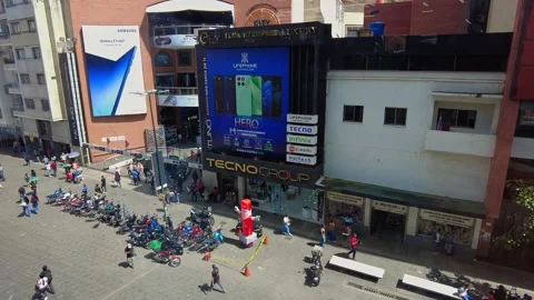 A specialty electronics store on Sabana Grande Boulevard with people walking in Stock Footage 332380852