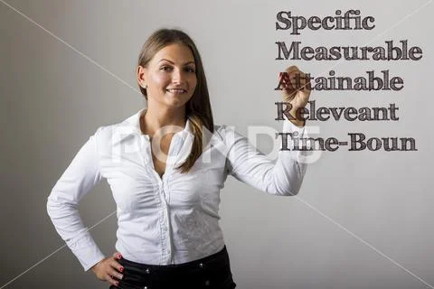 Specific Measurable Attainable Releveant Time-Bound SMART - Beautiful girl .. Stock Photos