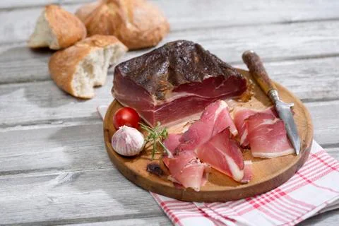 Speck Alto Adige with Italian white bread Stock Photos