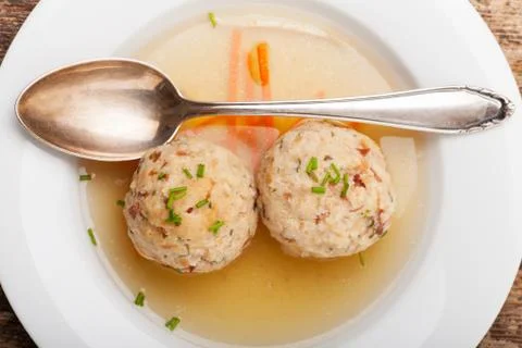 Speckknoedel, a tyrolean dumpling in broth Stock Photos
