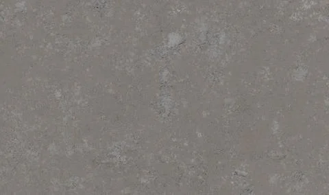 A speckled, medium taupe-grey surface with subtle light and dark grey fleck.. Stock Photos