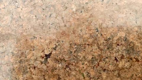 Speckled pink granite stone surface texture detail stock photo rock Fotos de archivo