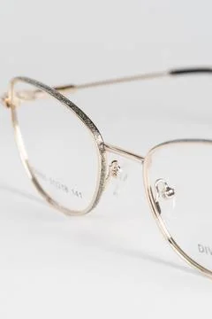 Spectacle frame lies on the table for optics Stock Photos