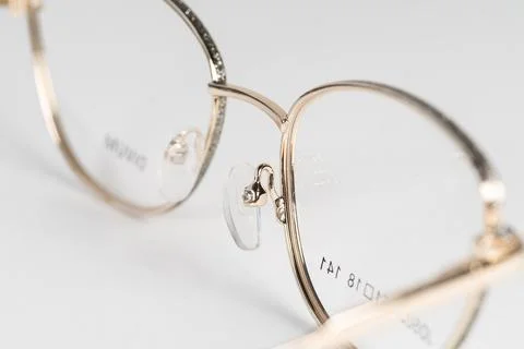 Spectacle frame lies on the table for optics Stock Photos