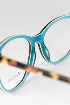 Spectacle frame lies on the table for optics Stock Photos