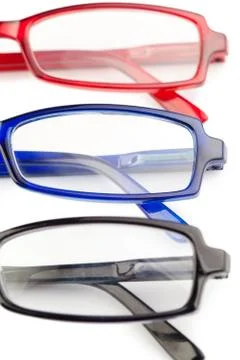 Spectacles with blue frames black frames and red frames Stock Photos