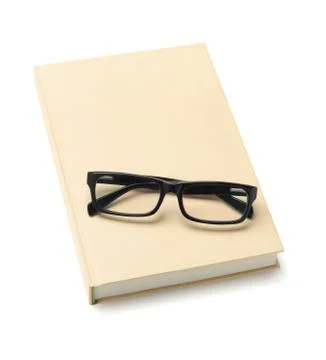 Spectacles on book Stock Photos