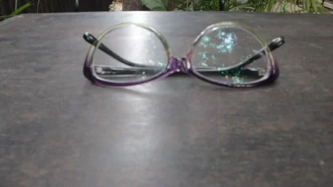 A spectacles over a table 스톡 동영상 142186744