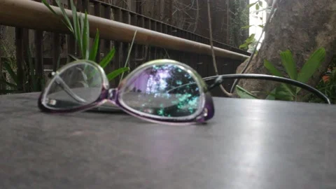 A  spectacles over a table 스톡 동영상 142186807