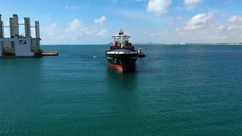 Spectacular aerial view of container ship entering in the port of Alicante. Stock Footage 137552617