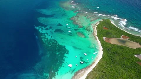 Spectacular Aerial View of a Secluded Cove with Crystal Clear Turquoise Waters Stock Footage 281671253