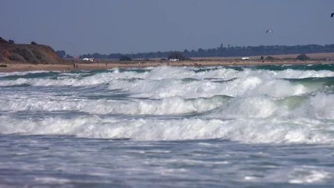 Spectacular big waves hit beach during storm. Video stock 126587519