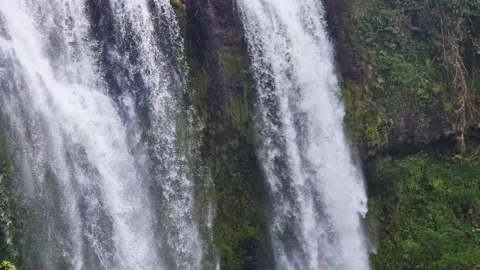 Spectacular Cascade: Close-Up and Slow Motion of a Magnificent Waterfall in Laos Stock Footage 240874151