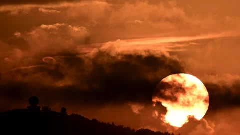 Spectacular close-up of the sunset process. Orange flaming sky. Stock Footage 256668168