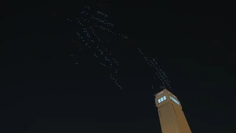 Spectacular drone light show performance in the night sky over Bangkok. Stock Footage 323317249