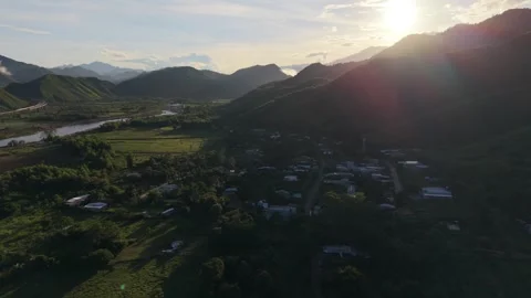 Spectacular Drone Turn Above River Valley and Mountains in Vietnam Stock-Footage 337948621