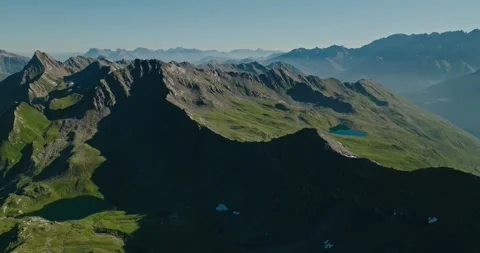 Spectacular Drone View of Alpine Lakes and Layered Mountains from 3000+ Meters Stock Footage 340899306