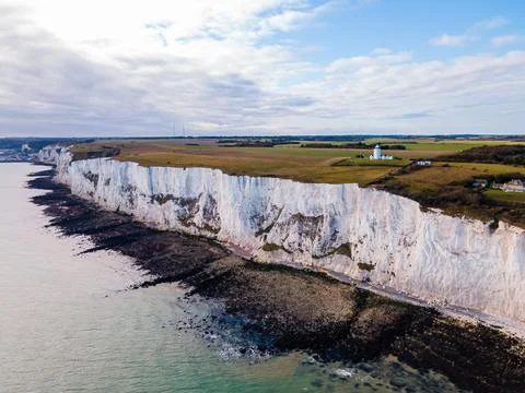 Spectacular Drone View of White Cliffs Embracing the Turquoise Waters of th.. Stock Photos