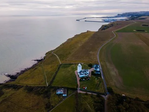 Spectacular Drone View of White Cliffs Embracing the Turquoise Waters of th.. Stock Photos
