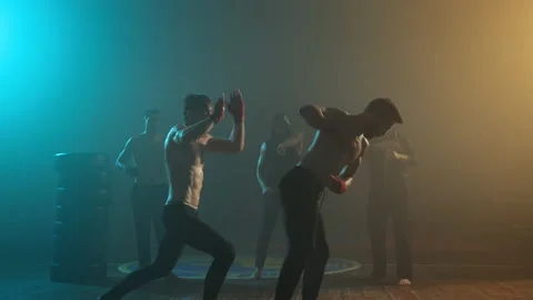 Spectacular Fight Of Two Boxers. Two Young Guys With Naked Torsos In The Ring Stock Footage 160766564