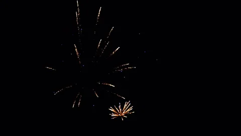 Spectacular firework show with vibrant lights in the night. Stock Footage 325992166