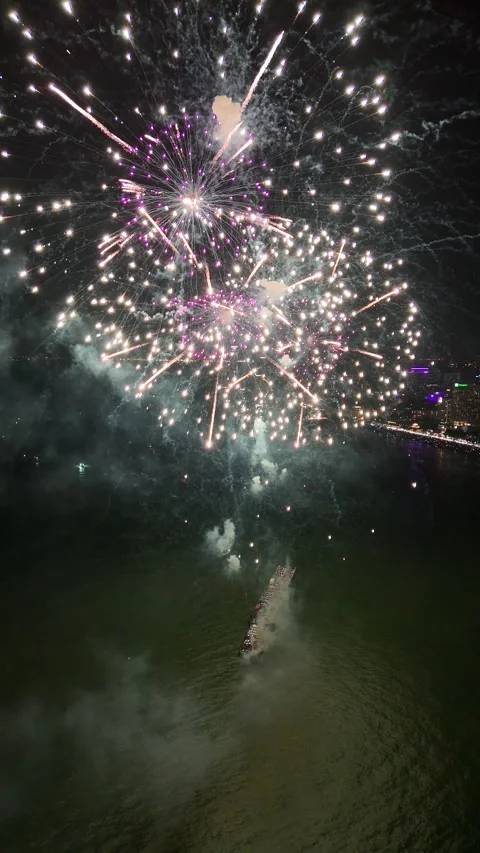 Spectacular Fireworks Display Exploding Over the Ocean in Pattaya, Thailand Stock Footage 335842533