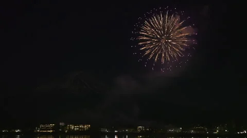 Spectacular fireworks display exploding over Lake Kawaguchiko Japan Video stock 339652396