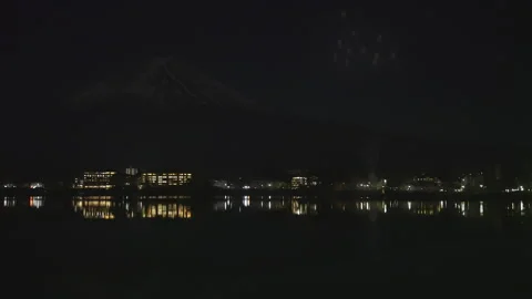 Spectacular fireworks display exploding over Lake Kawaguchiko Japan Vídeos de archivo 339652434